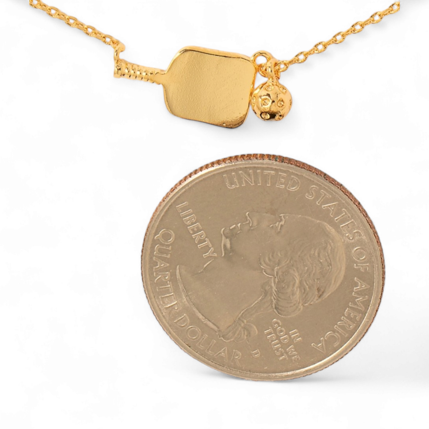 Gold Dipped Pickleball Pendant Necklace yellow gold size compared to a quarter